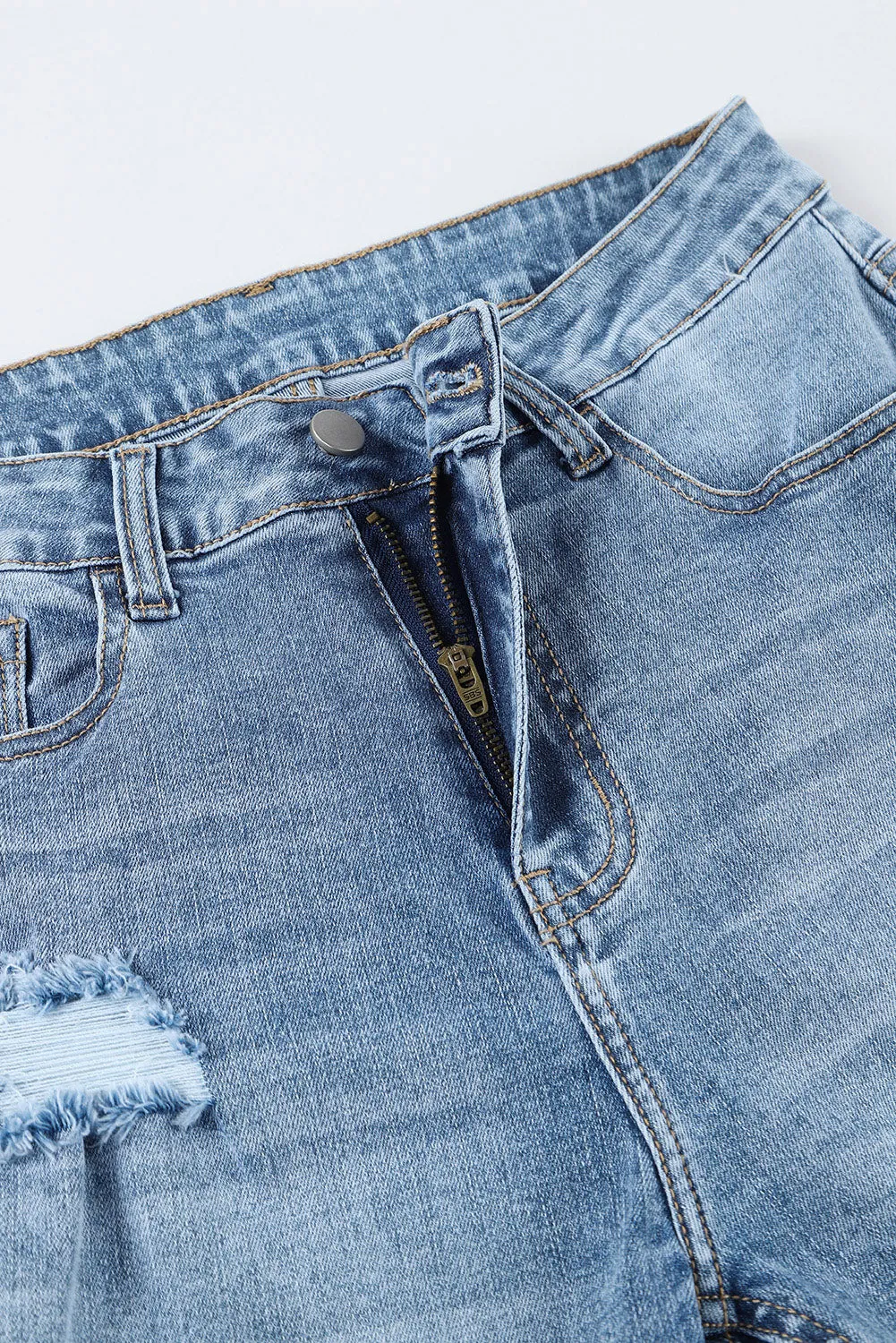Light Wash Distressed High Rise Flare Jeans