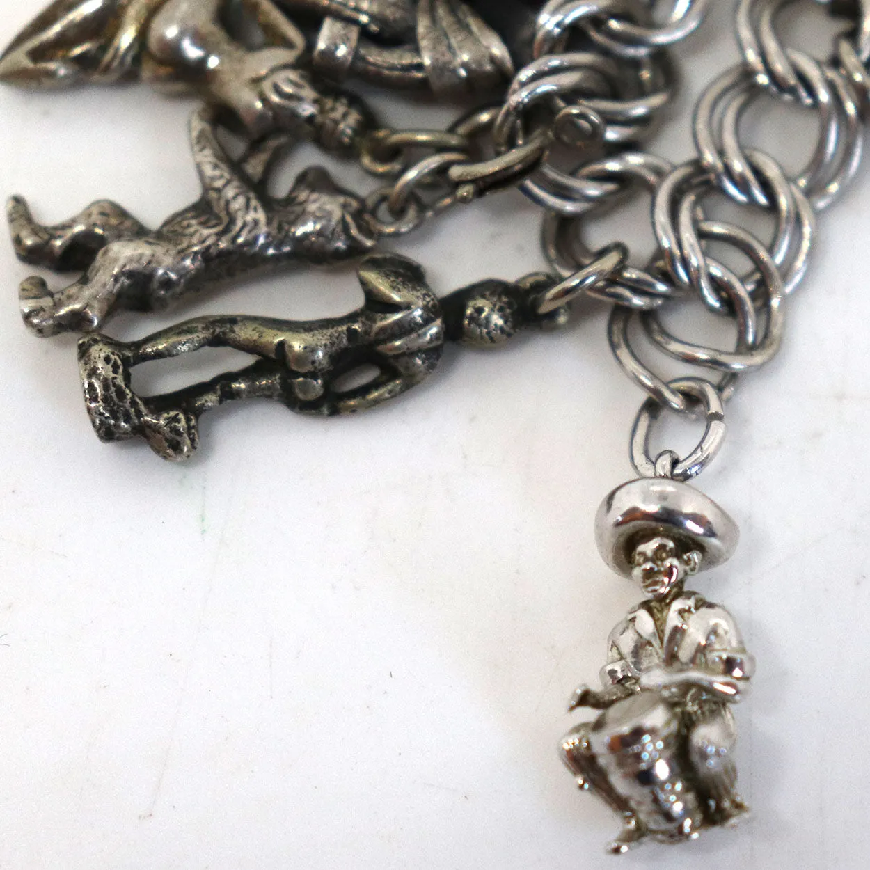 Vintage American and European Sterling Silver 23-Charm Rope Chain Bracelet