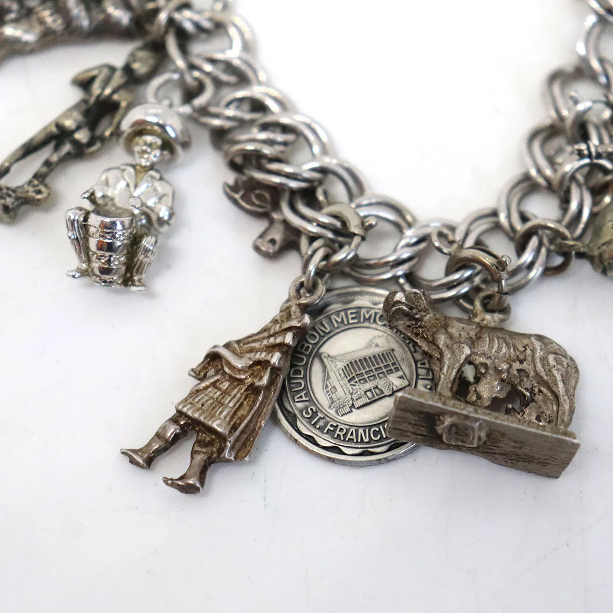 Vintage American and European Sterling Silver 23-Charm Rope Chain Bracelet